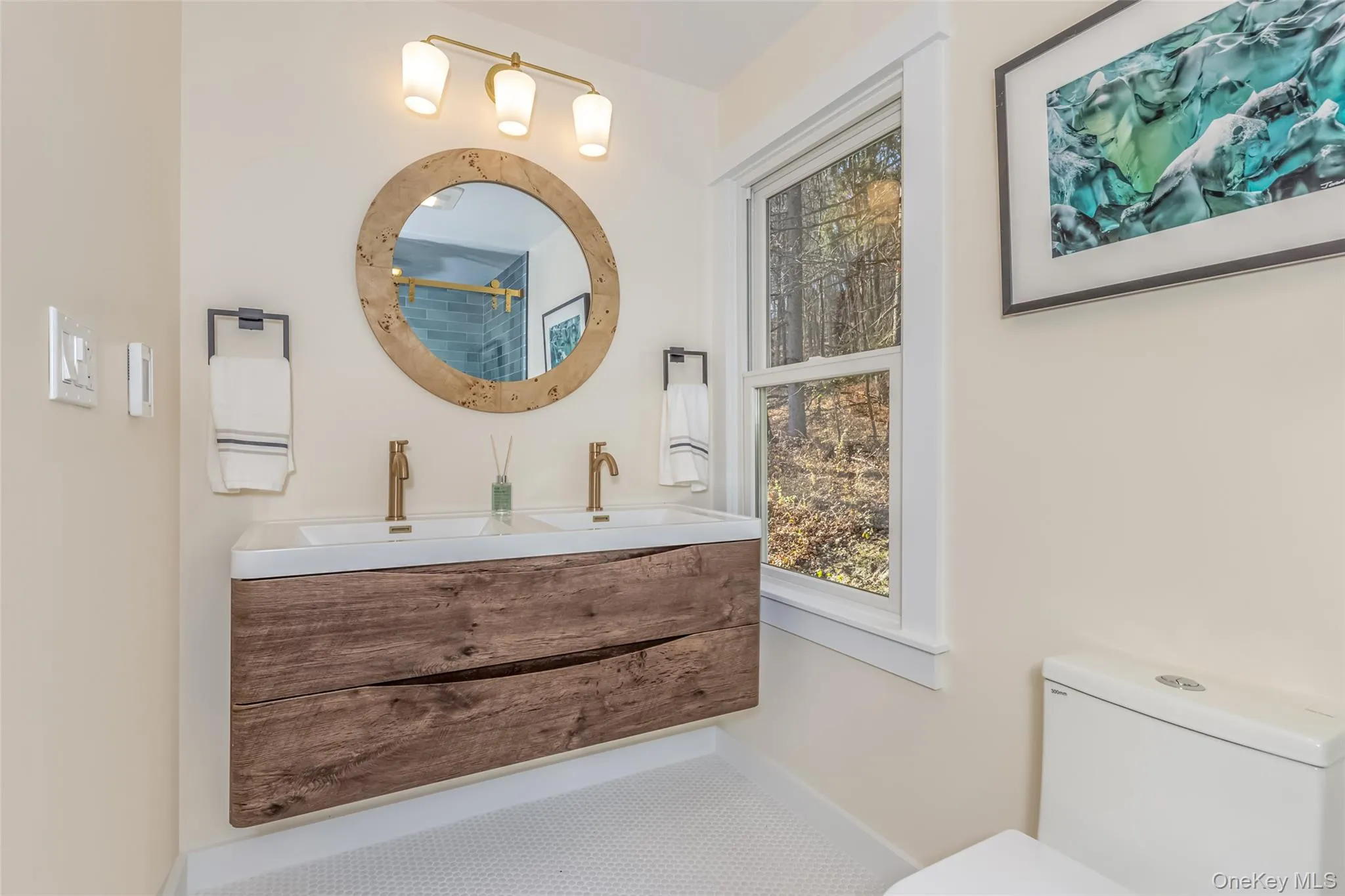 Bathroom featuring vanity and toilet Bathroom featuring vanity and toilet