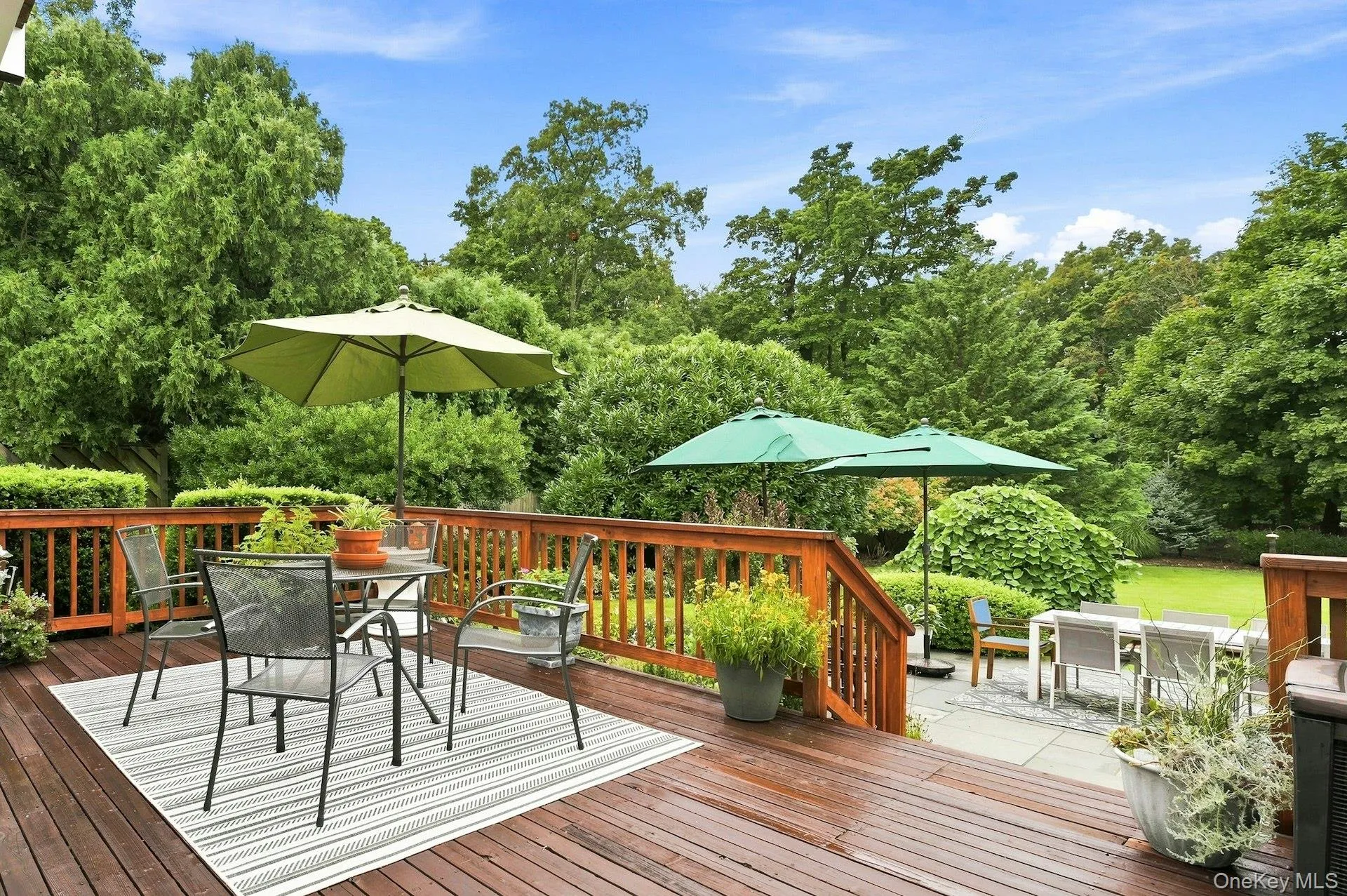 redwood deck off or kitchen and living room overlooking patio and backyard. redwood deck off or kitchen and living room overlooking patio and backyard.