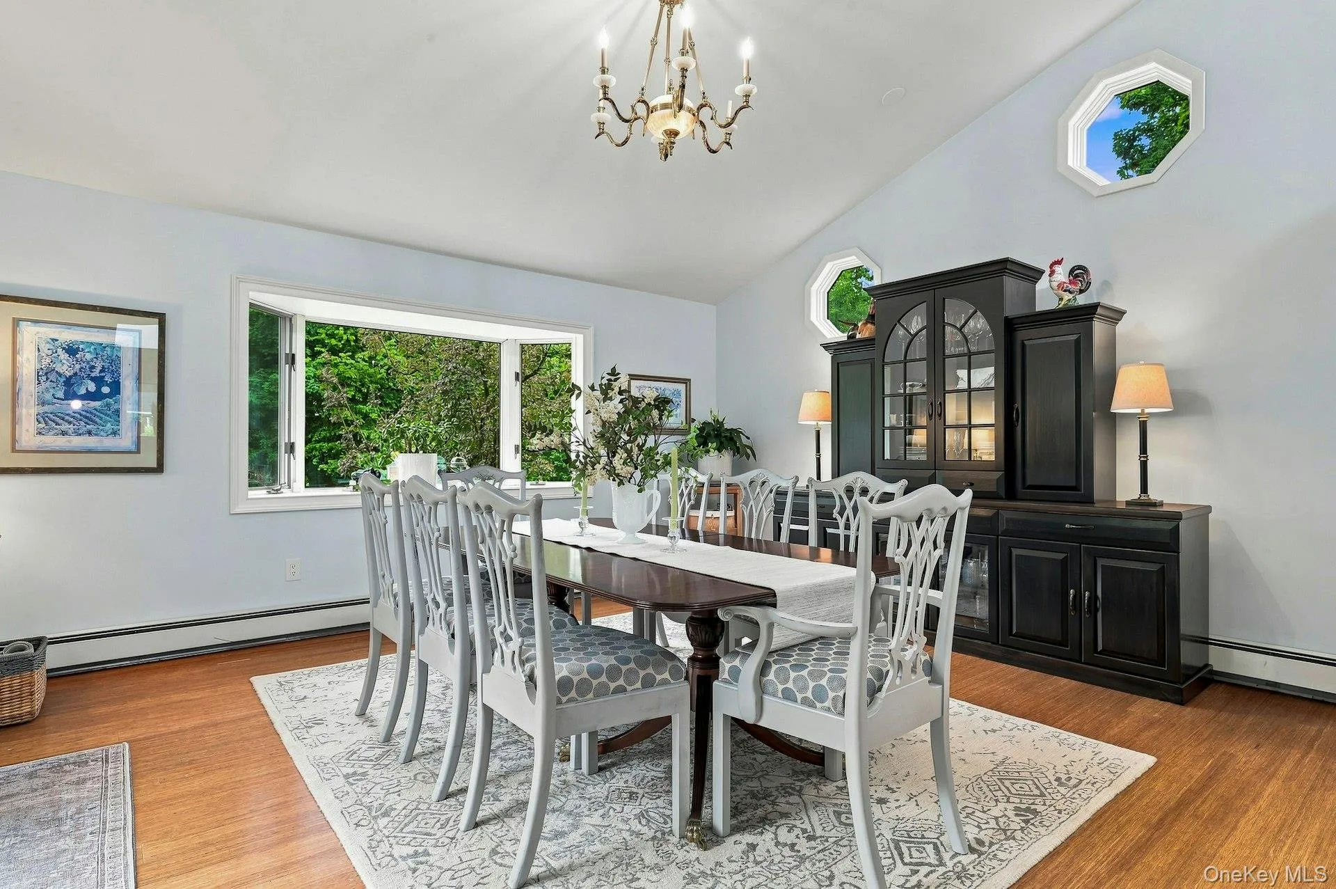 16 x 15 dining area with hardwood flooring with glass doors opening to deck. 16 x 15 dining area with hardwood flooring with glass doors opening to deck.