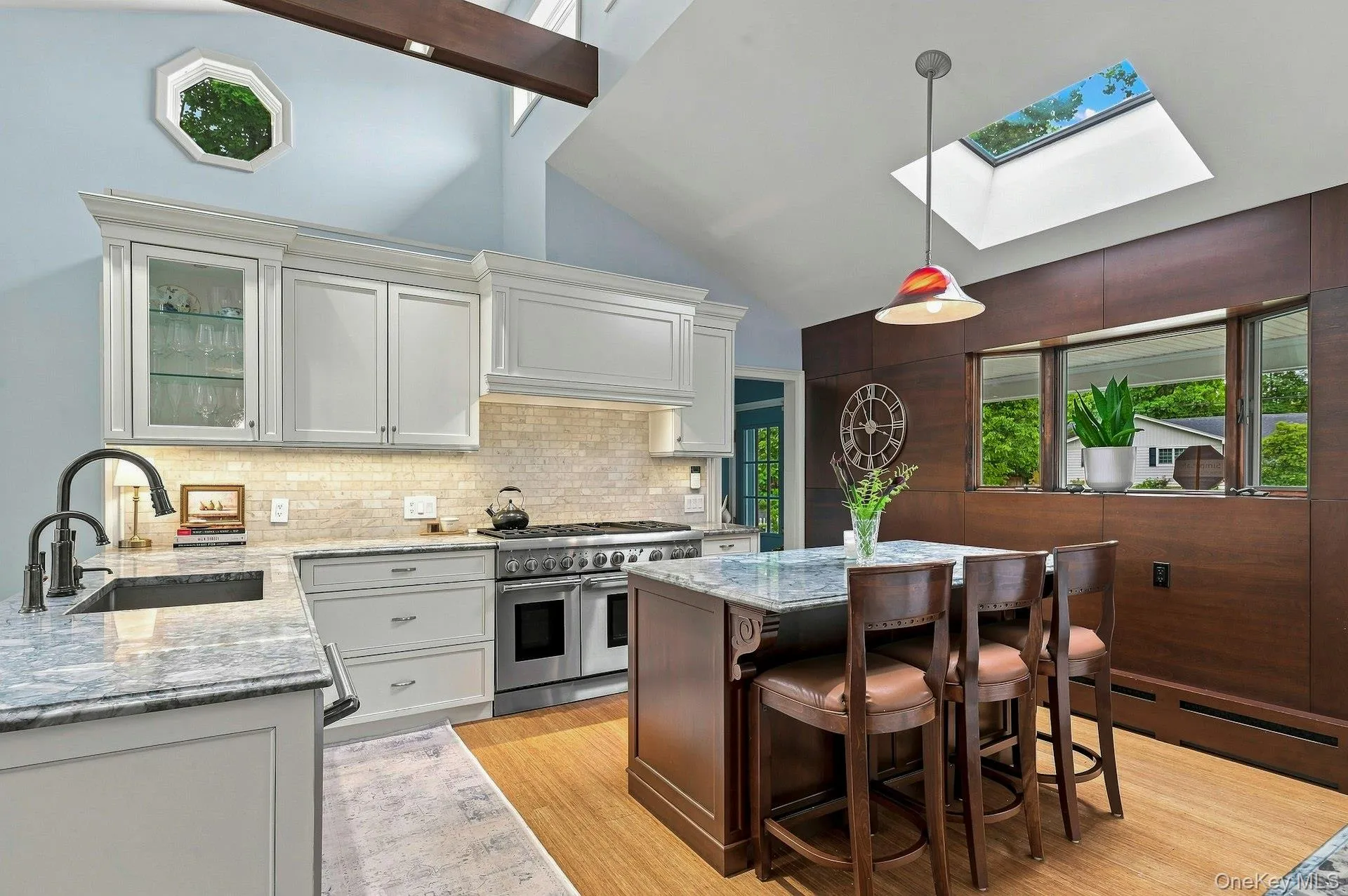 Custom cabinets, high end appliances skylight, granite countertops, hardwood flooring Custom cabinets, high end appliances skylight, granite countertops, hardwood flooring