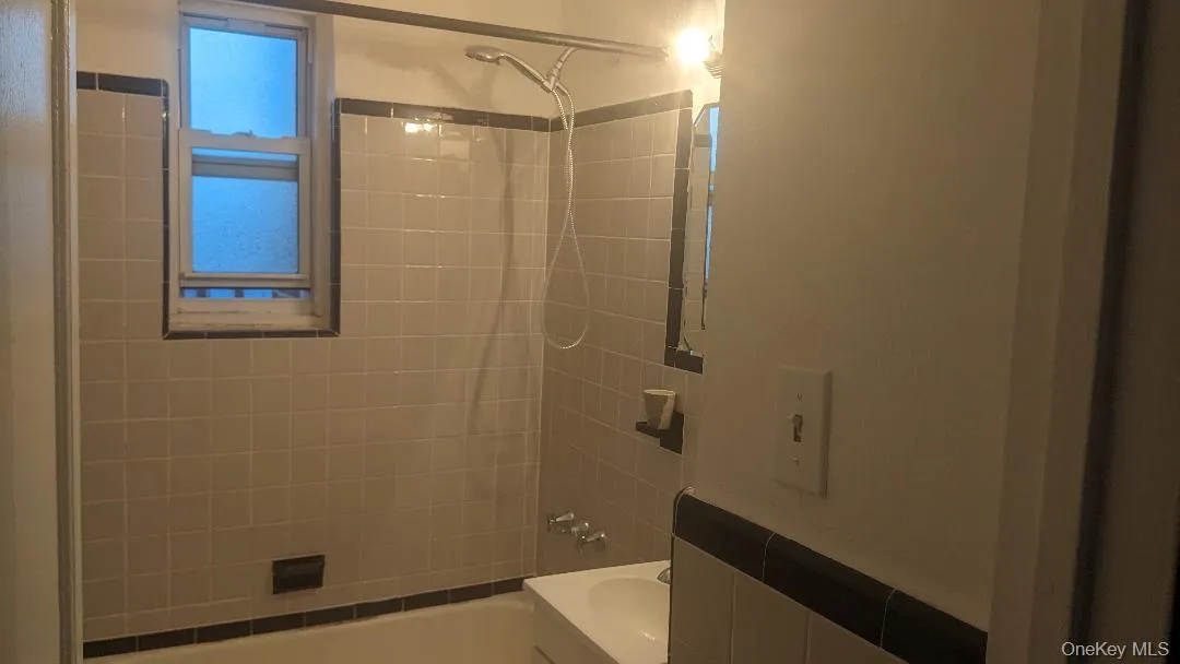 Tiled Bathroom with window Tiled Bathroom with window
