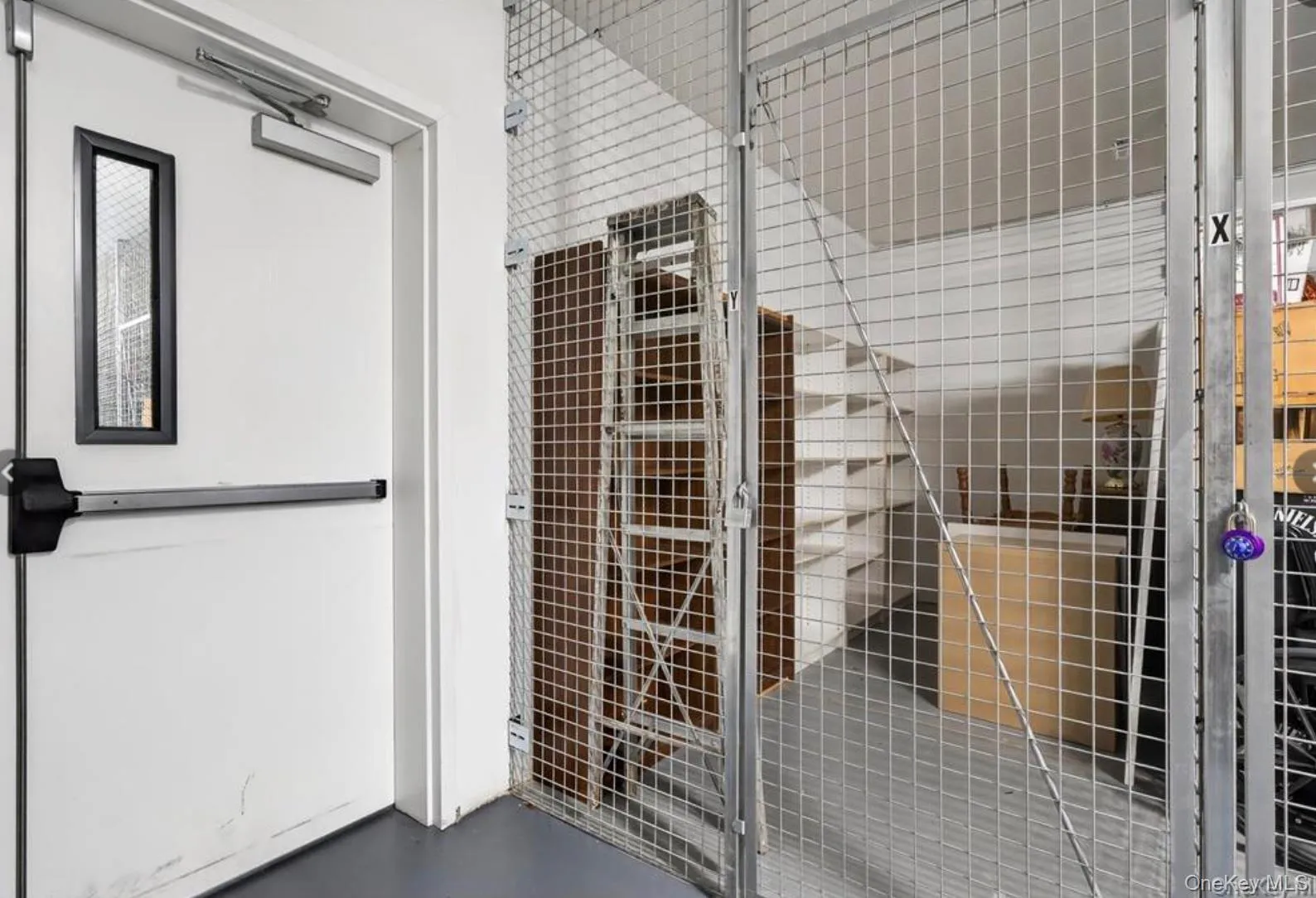 Large private storage unit in the lower level included with the condo Large private storage unit in the lower level included with the condo