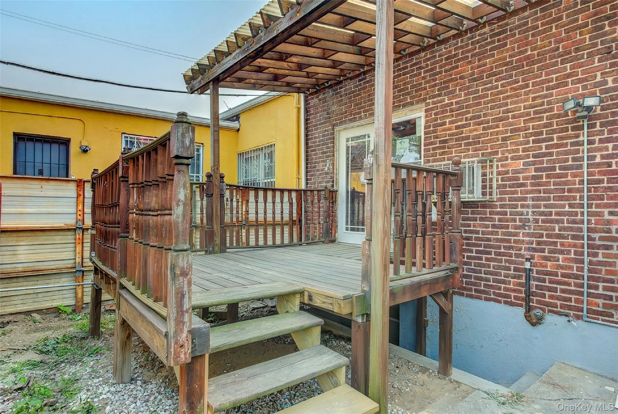 Backyard porch/ back entrance to basement Backyard porch/ back entrance to basement