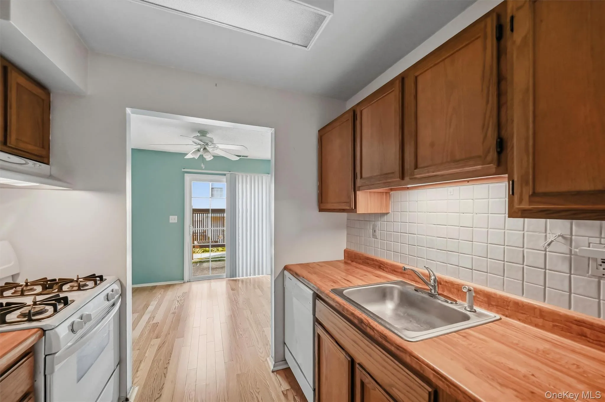There is a large overhead light in the kitchen There is a large overhead light in the kitchen
