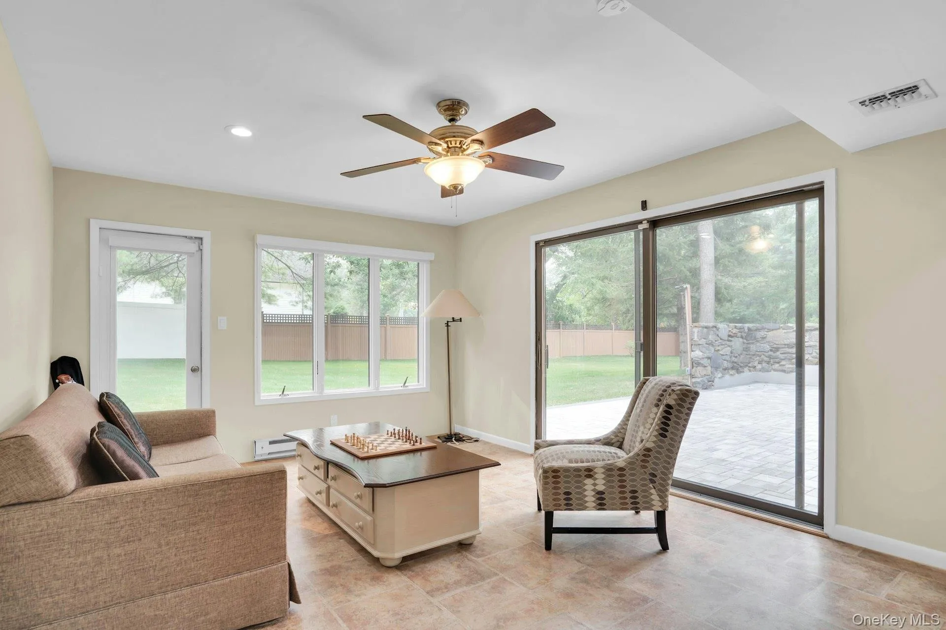 Den has sliders to patio and outside entrance. Den has sliders to patio and outside entrance.