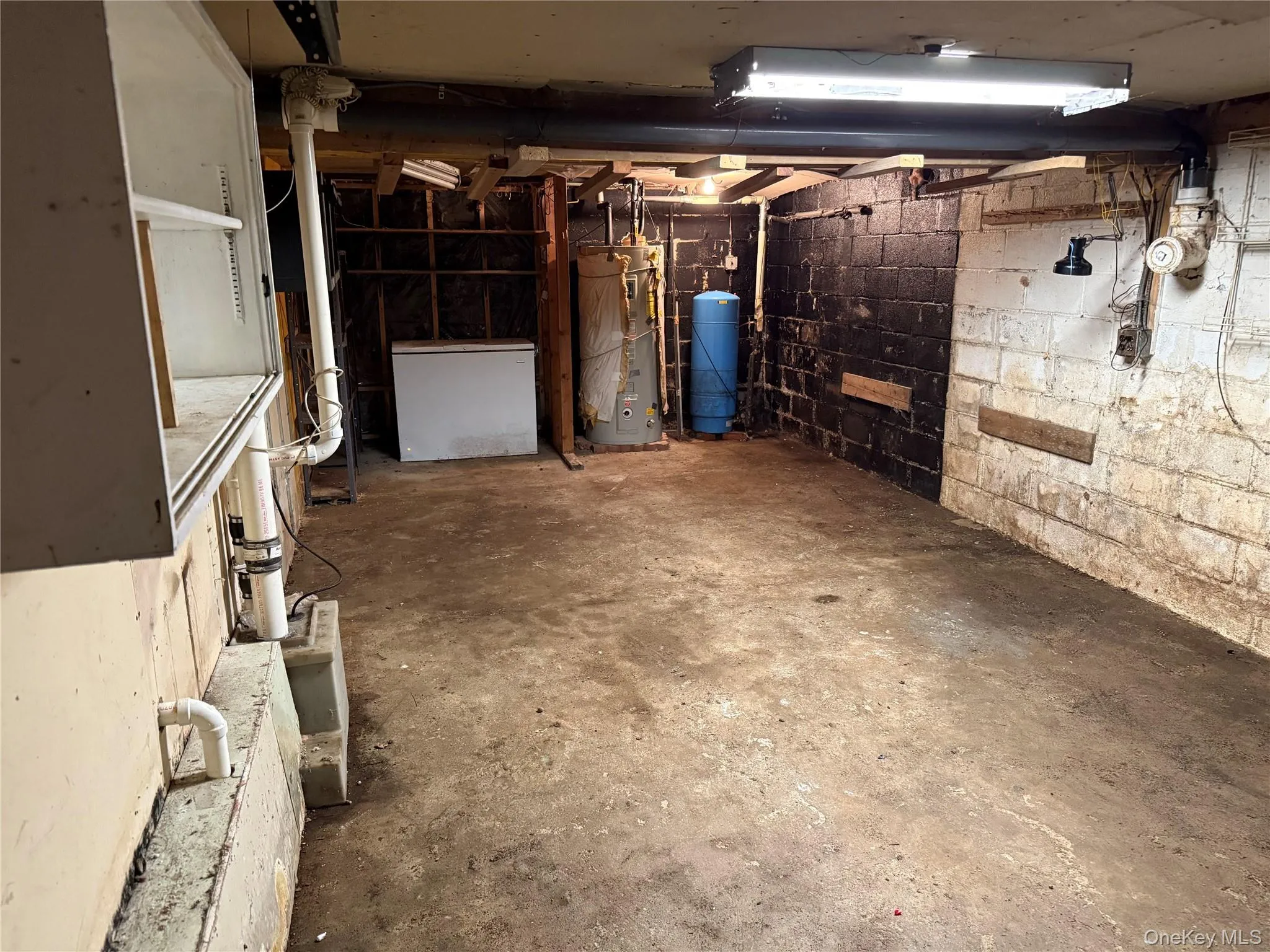 Garage and utilities area, accessible from the basement. Garage and utilities area, accessible from the basement.