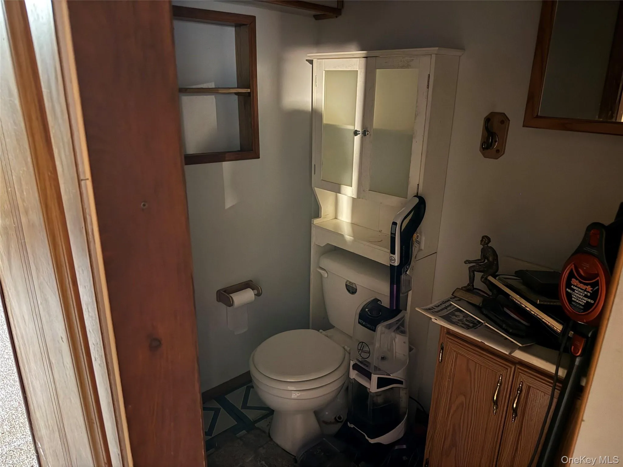 Half bathroom located in the basement. Half bathroom located in the basement.