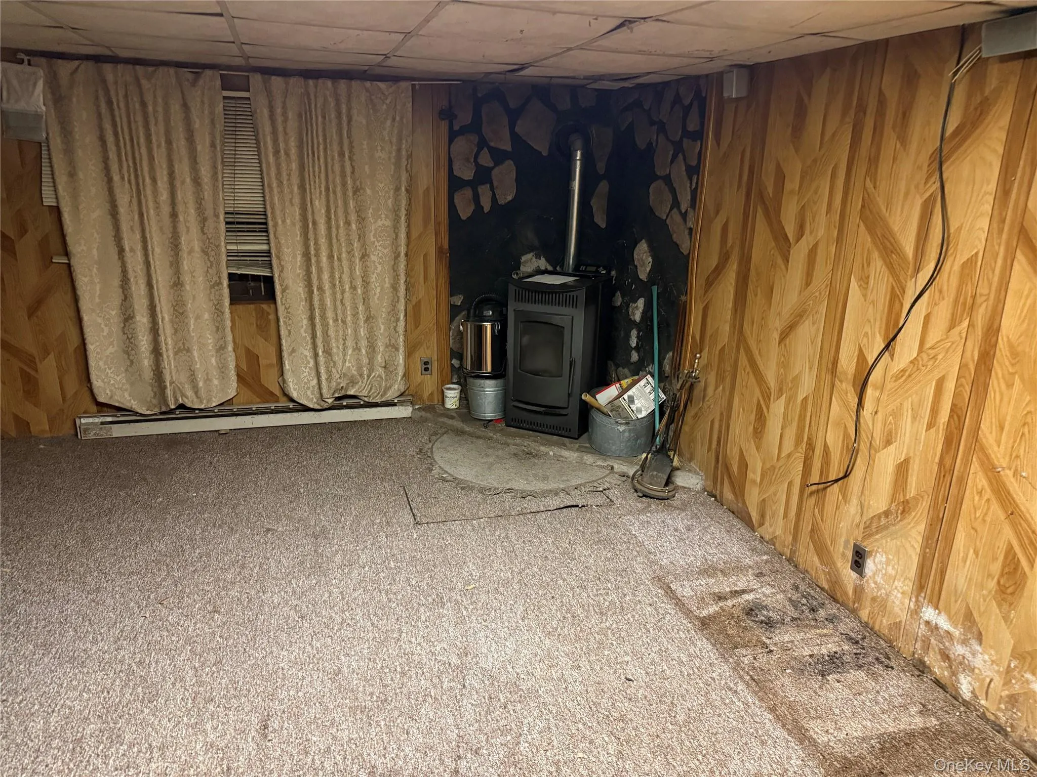 Second basement room with pellet stove. Second basement room with pellet stove.