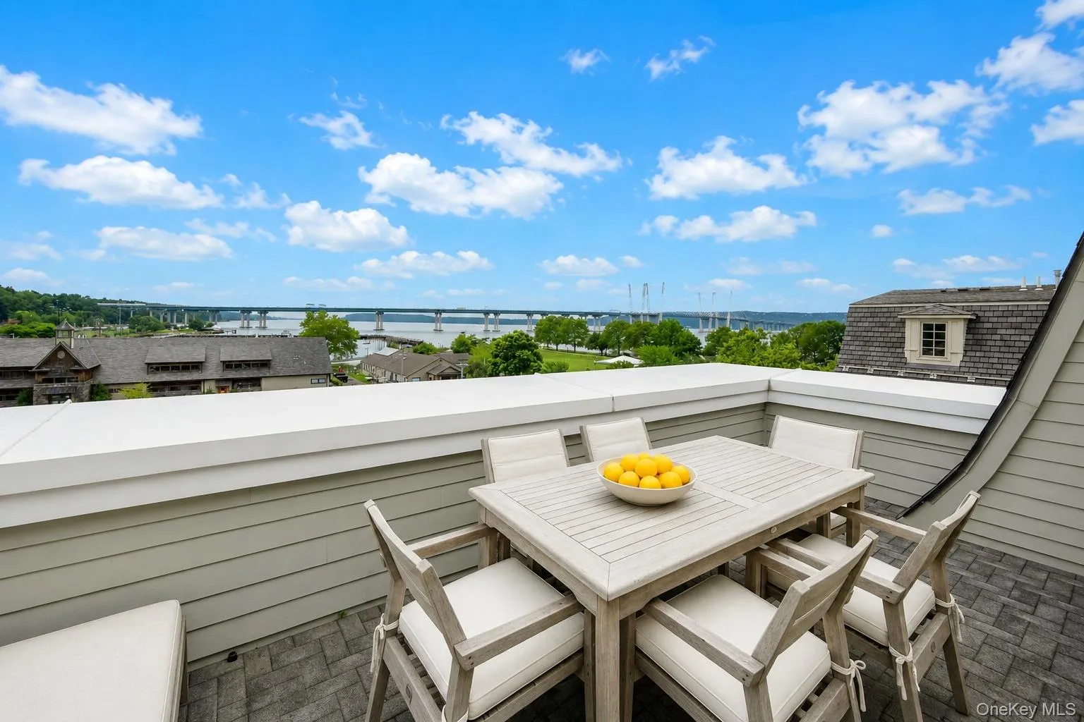Deck offers panoramic south/ west views of river, bridge and sunsets Deck offers panoramic south/ west views of river, bridge and sunsets