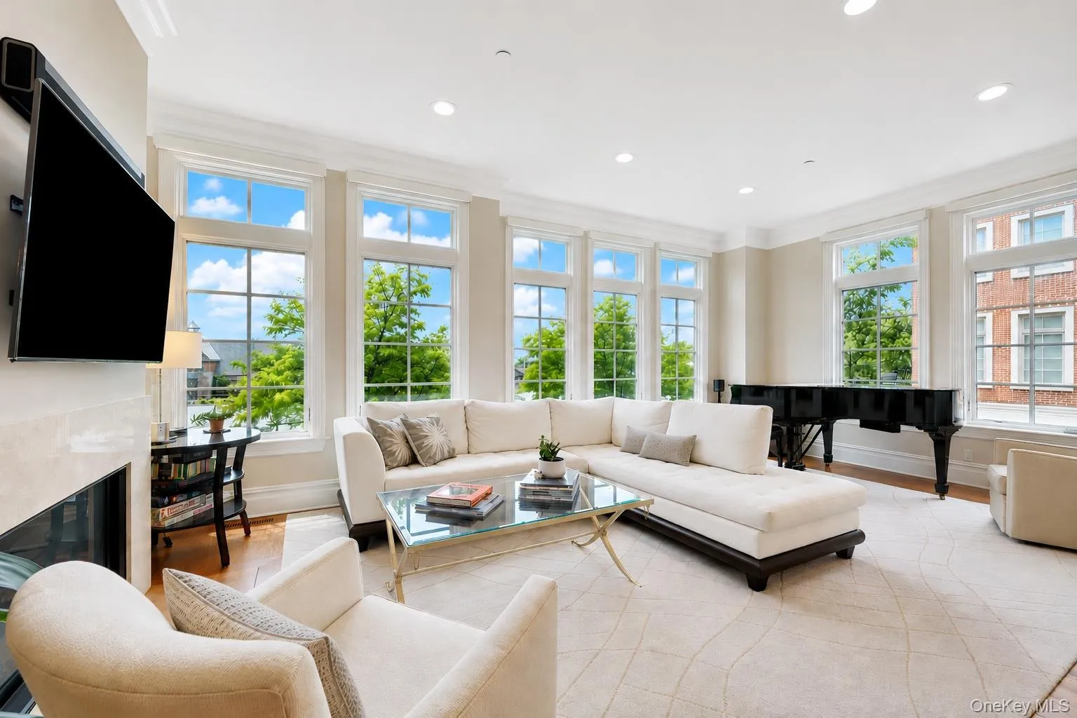 Sprawling and sunny, complete with fireplace and oversized windows that allow for river views Sprawling and sunny, complete with fireplace and oversized windows that allow for river views