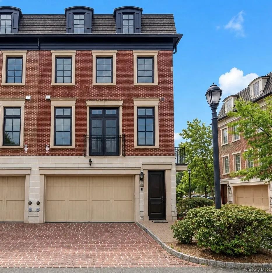 Two car garage w/ EV charging station and 2 car driveway Two car garage w/ EV charging station and 2 car driveway