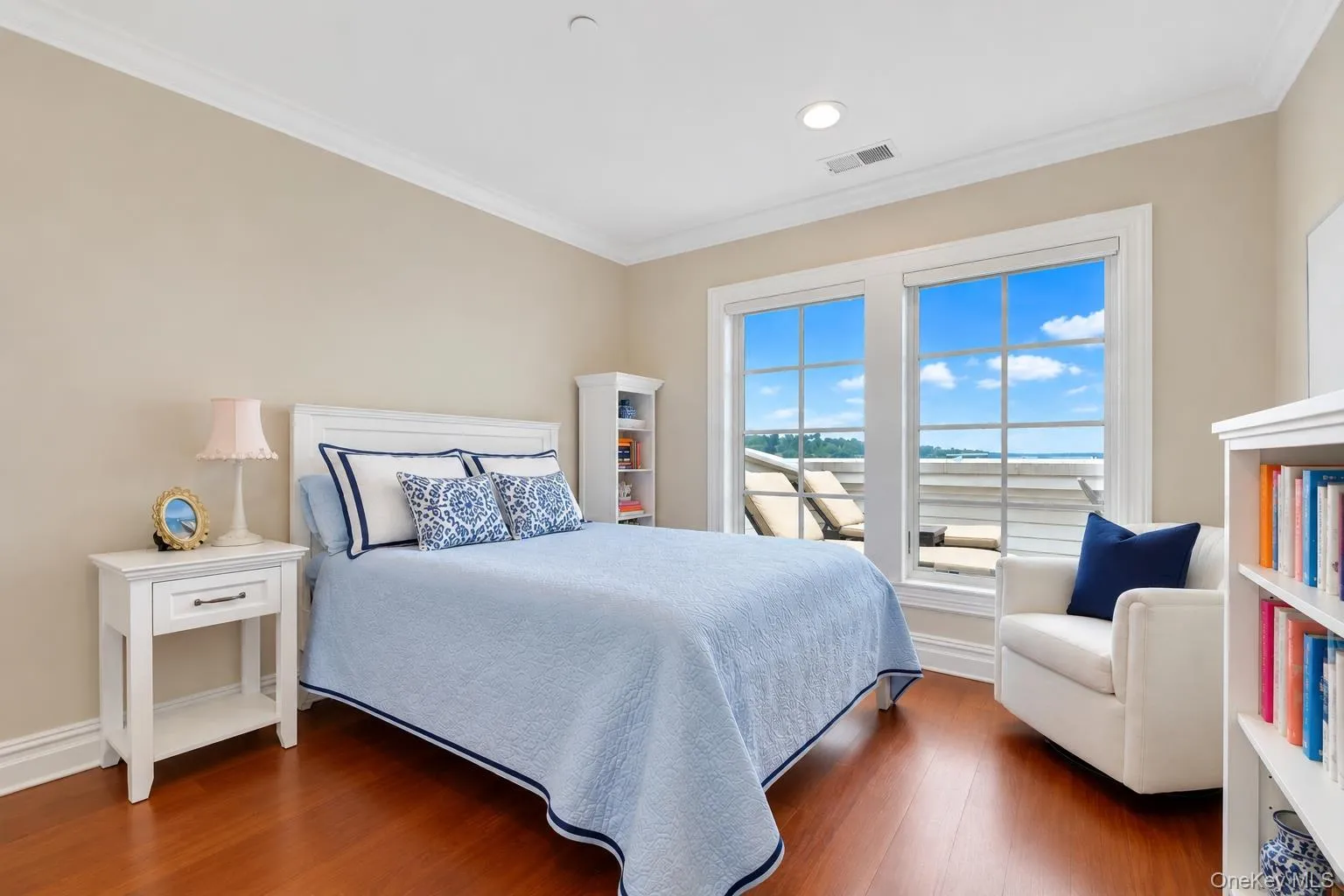Sun-filled 4th floor bedroom features walk-in closet and river view Sun-filled 4th floor bedroom features walk-in closet and river view