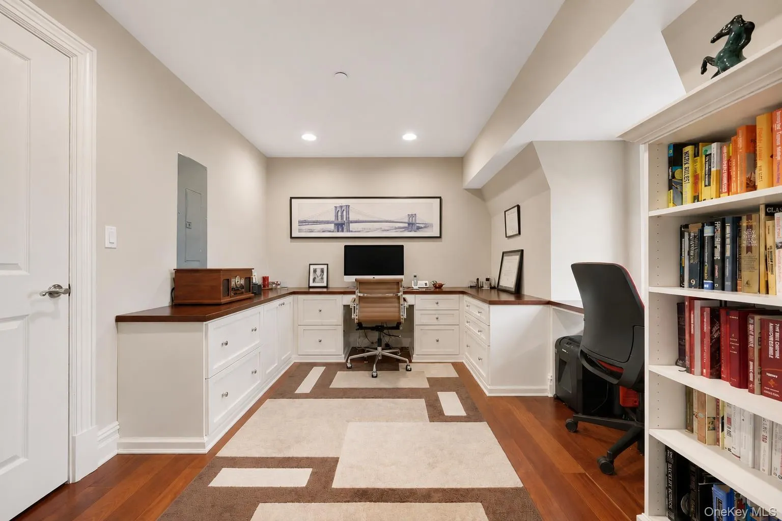 4th floor office with custom built-in desk and cabinetry 4th floor office with custom built-in desk and cabinetry