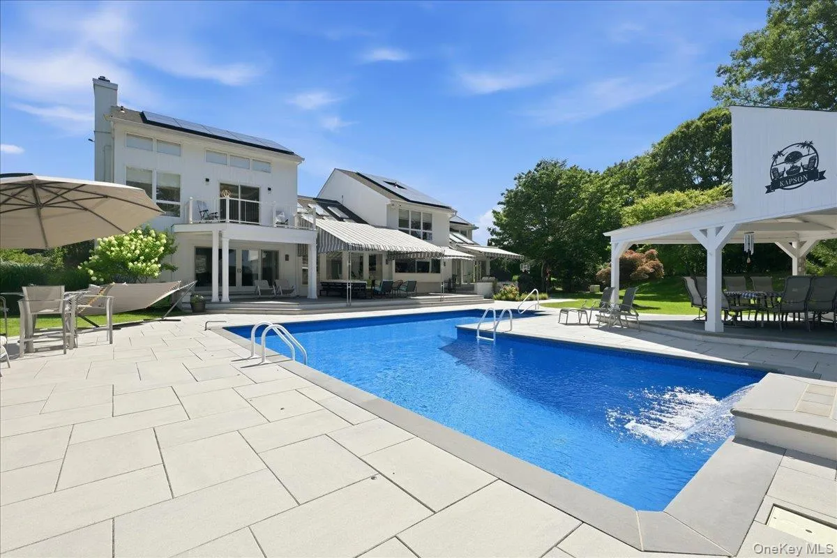 L-shaped pool with waterfall L-shaped pool with waterfall