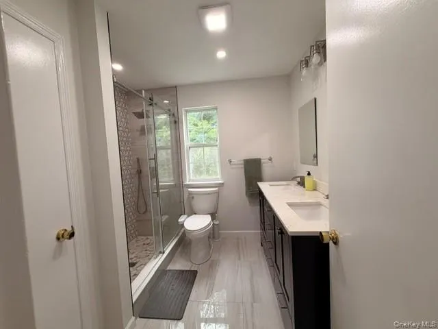 New Primary Bathroom with double sinks and pretty floor New Primary Bathroom with double sinks and pretty floor