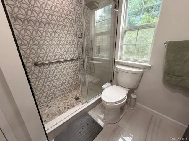 Primary Bathroom Shower with beautiful tile. Primary Bathroom Shower with beautiful tile.