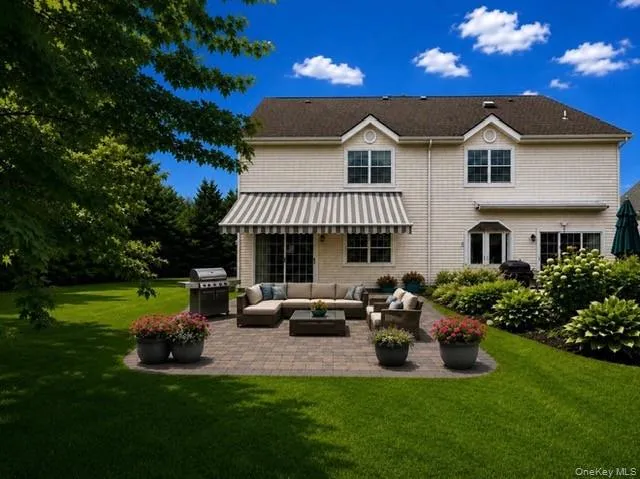 AI - Virtual Reality Picture adding in a cobblestone patio, flowers, and deck furniture. AI - Virtual Reality Picture adding in a cobblestone patio, flowers, and deck furniture.