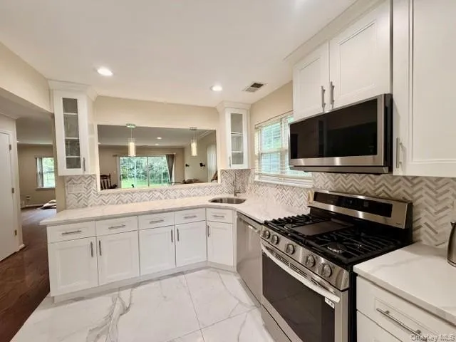 Brand New Kitchen! White Marble Counters. Brand New Kitchen! White Marble Counters.