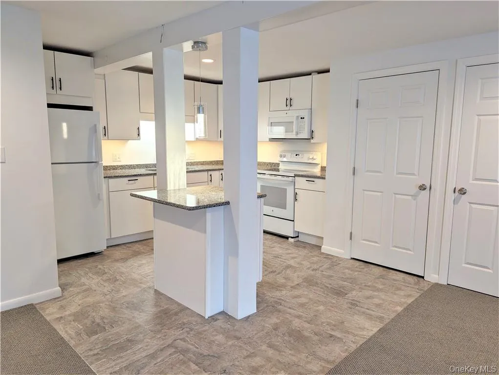 Kitchen with small island for seating Kitchen with small island for seating