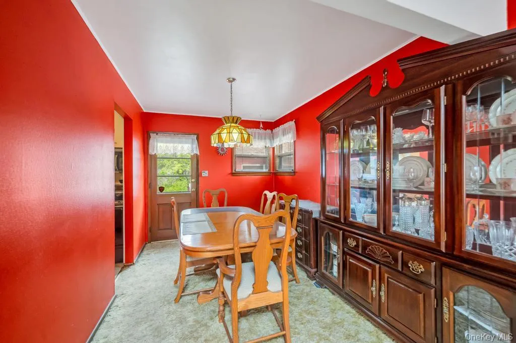 Dining area with a functional door leading to the exterior Dining area with a functional door leading to the exterior