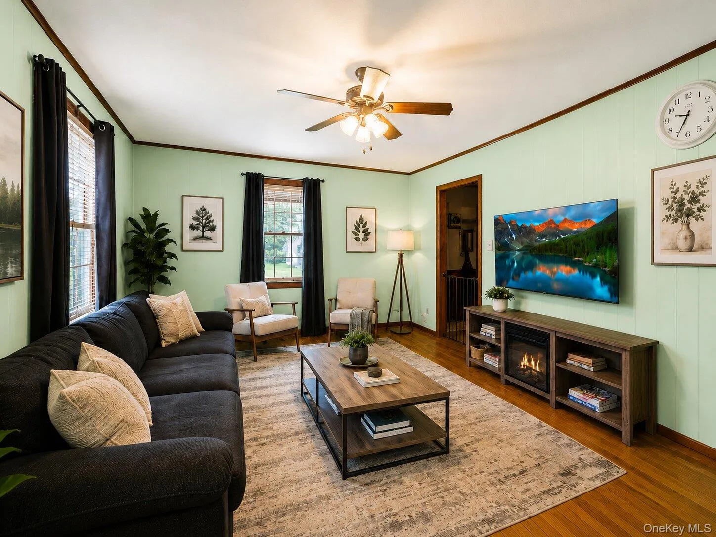Virtually Staged: Spacious and inviting living room featuring hardwood floors, plenty of natural light, and a flexible layout with ample room for relaxing, entertaining, or spending time with family. Virtually Staged: Spacious and inviting living room featuring hardwood floors, plenty of natural light, and a flexible layout with ample room for relaxing, entertaining, or spending time with family.