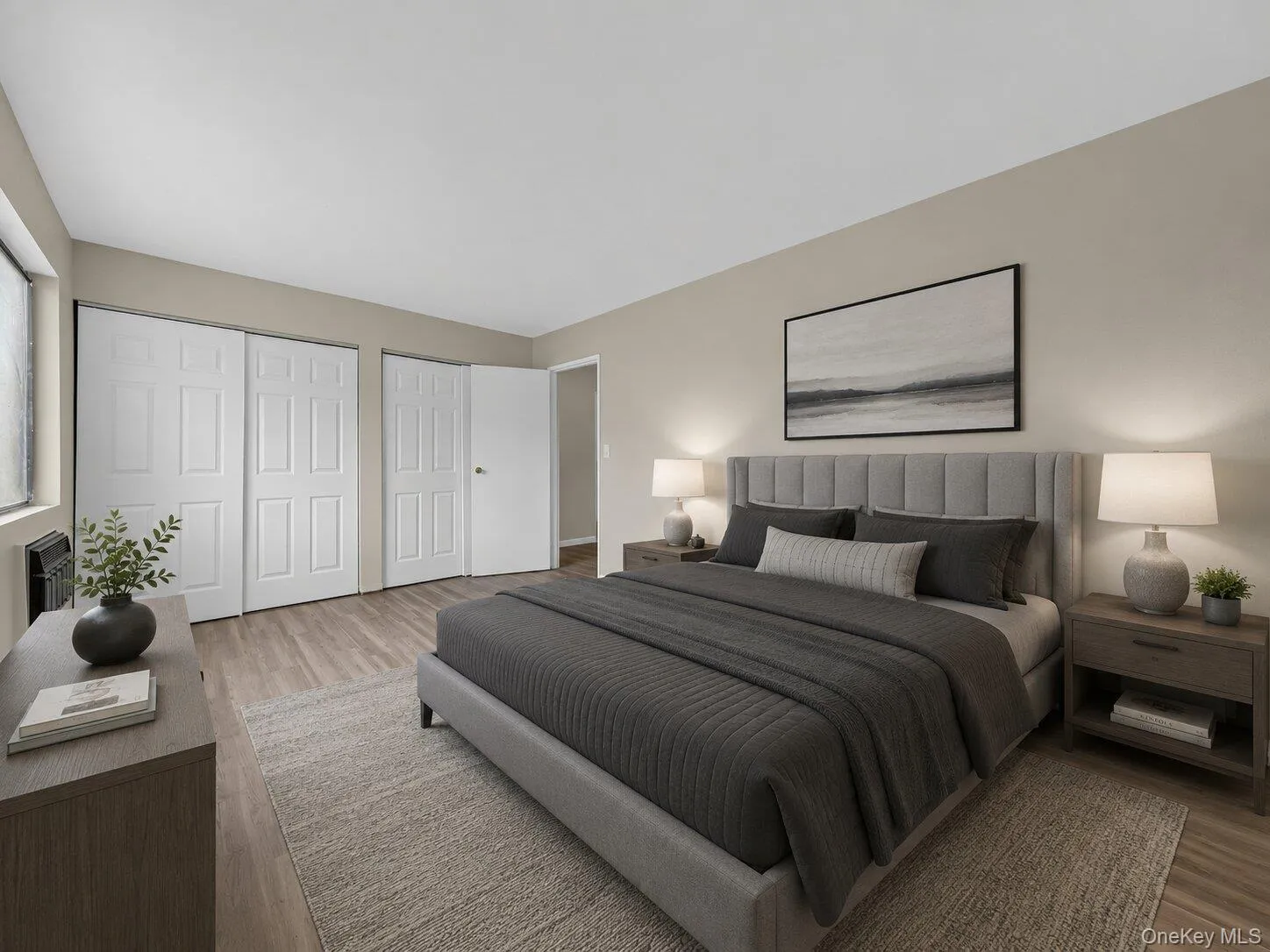 Virtually Staged Primary Bedroom – Spacious bedroom with generous closet storage, neutral décor, and plenty of room for a king-size bed and additional furniture. Virtually Staged Primary Bedroom – Spacious bedroom with generous closet storage, neutral décor, and plenty of room for a king-size bed and additional furniture.