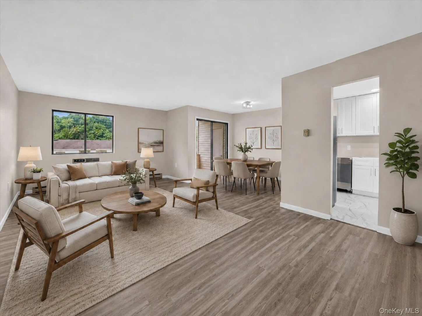 Virtually Staged Open Living Space – Another view highlighting the spacious living room, dining area, abundant natural light, and seamless flow throughout the home. Virtually Staged Open Living Space – Another view highlighting the spacious living room, dining area, abundant natural light, and seamless flow throughout the home.