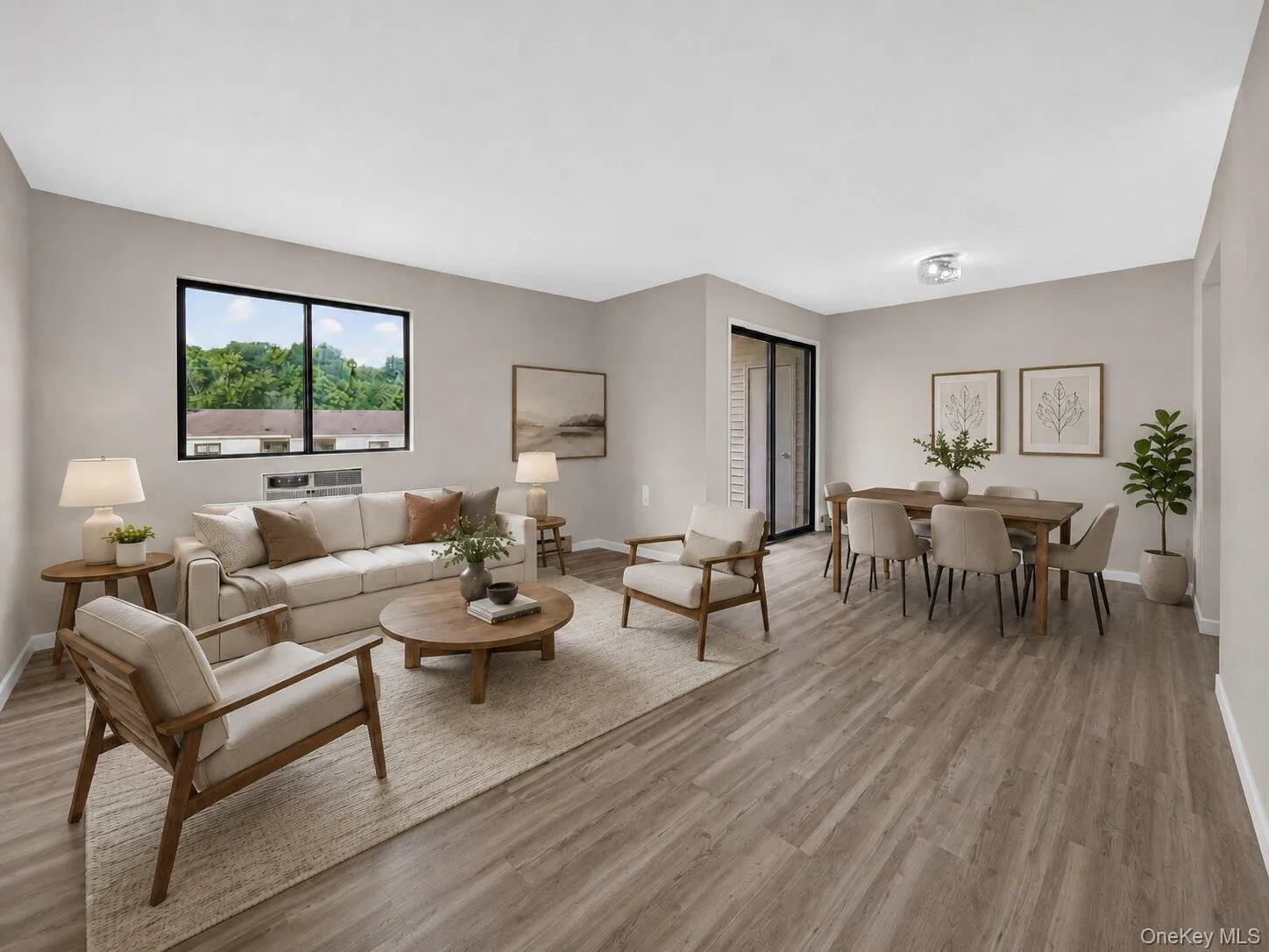 Virtually Staged Living and Dining Area – Open-concept living space offering a comfortable layout for relaxing, dining, and entertaining, with easy access to the kitchen and balcony. Virtually Staged Living and Dining Area – Open-concept living space offering a comfortable layout for relaxing, dining, and entertaining, with easy access to the kitchen and balcony.