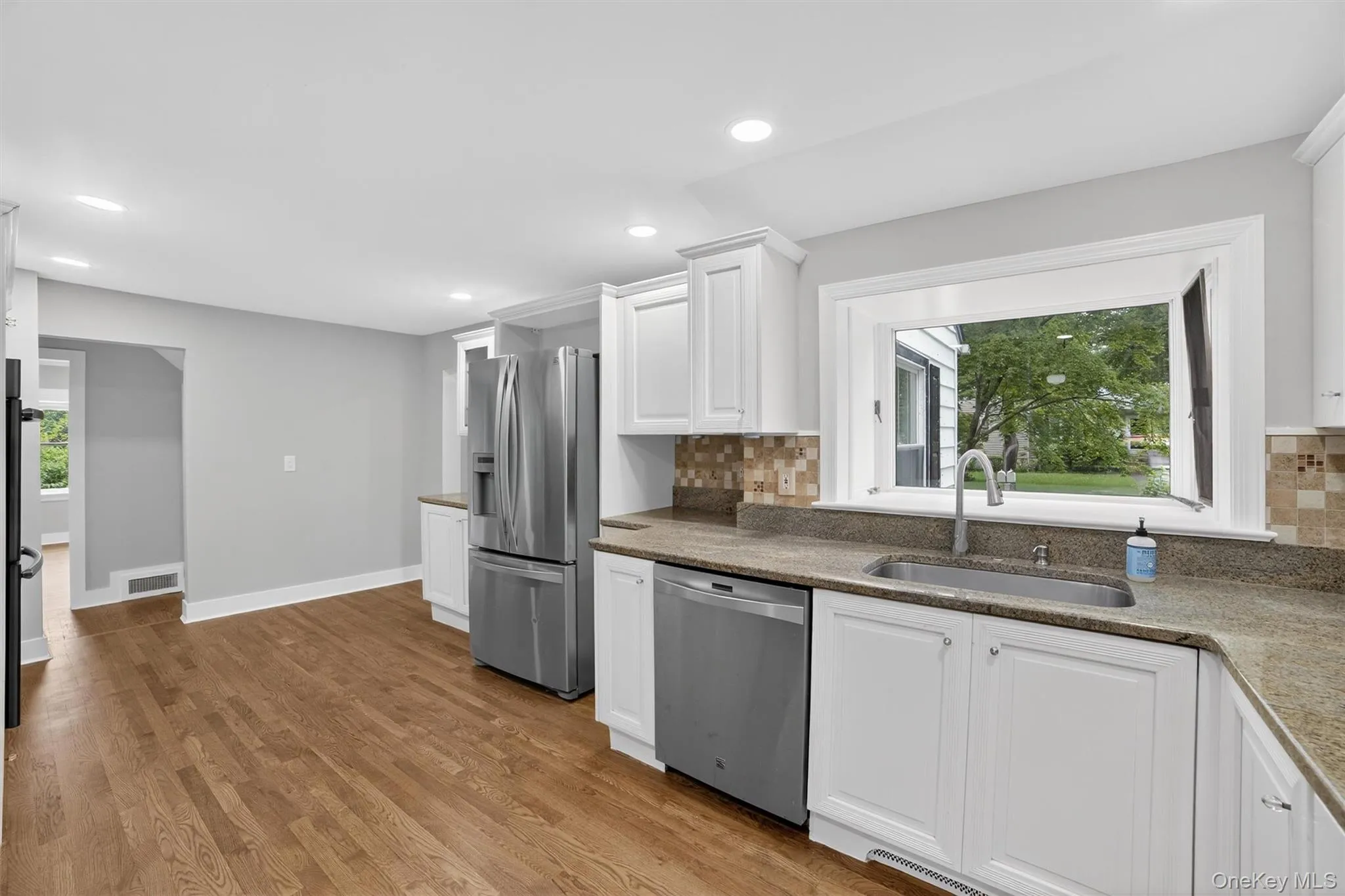 Eat-in Kitchen with door out to Screened-in Porch Eat-in Kitchen with door out to Screened-in Porch