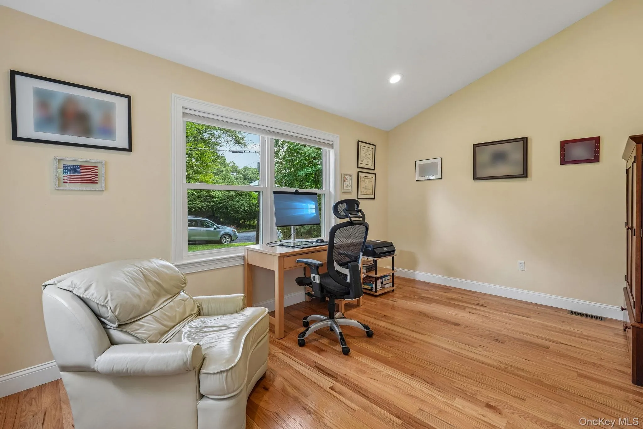 Part of the addition is a home office with vaulted ceilings, recessed lighting and hardwood floors Part of the addition is a home office with vaulted ceilings, recessed lighting and hardwood floors