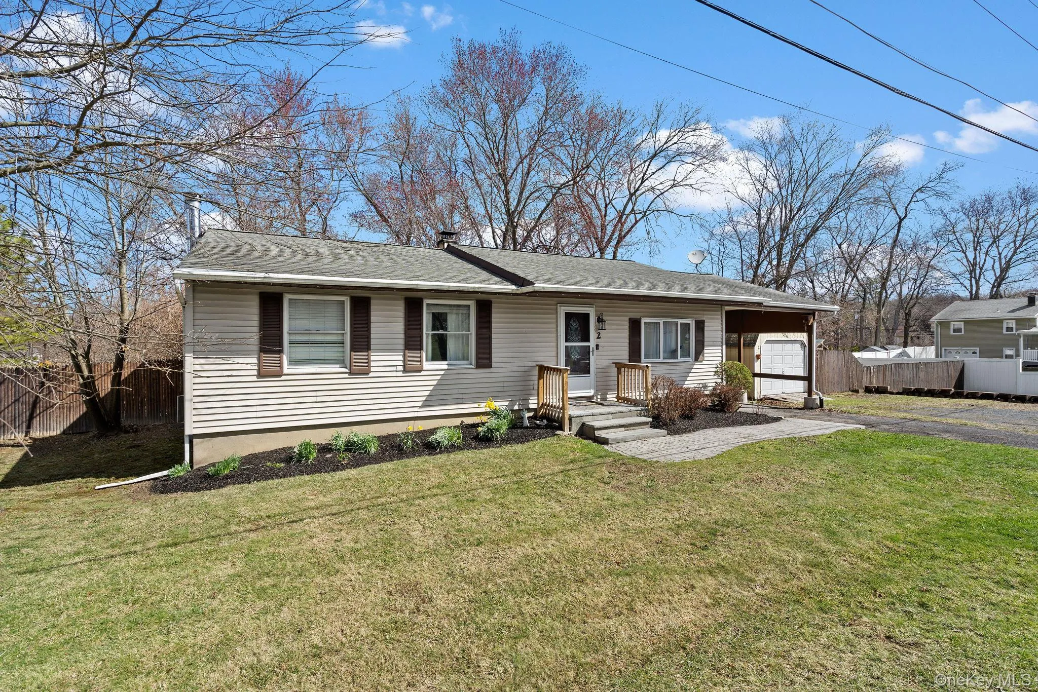 Ranch-style house featuring fence and a front yard Ranch-style house featuring fence and a front yard
