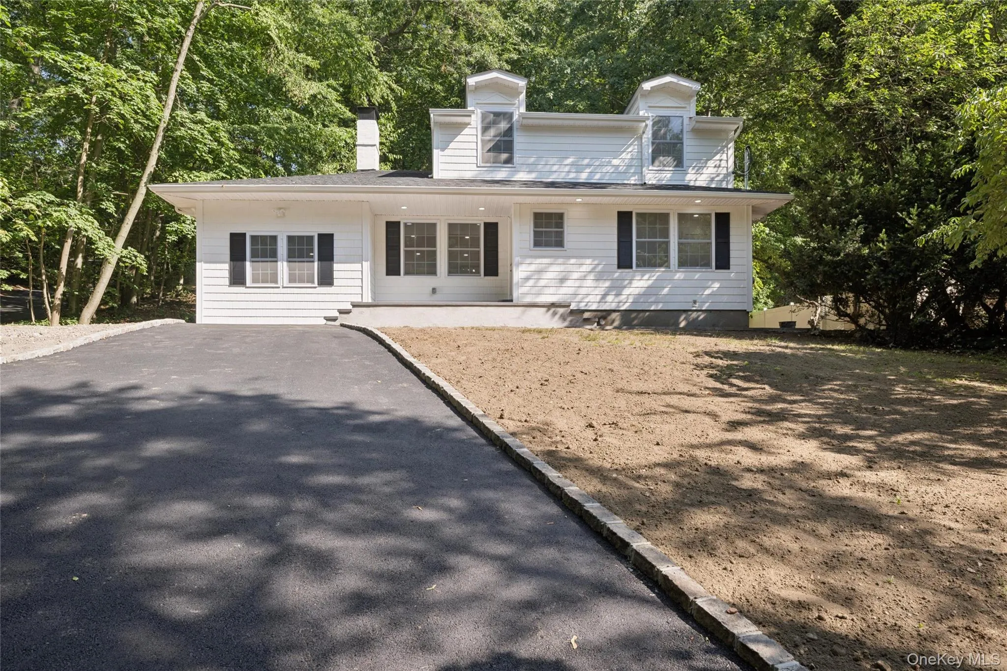 Exterior front, all new siding, new shutters, new windows Exterior front, all new siding, new shutters, new windows