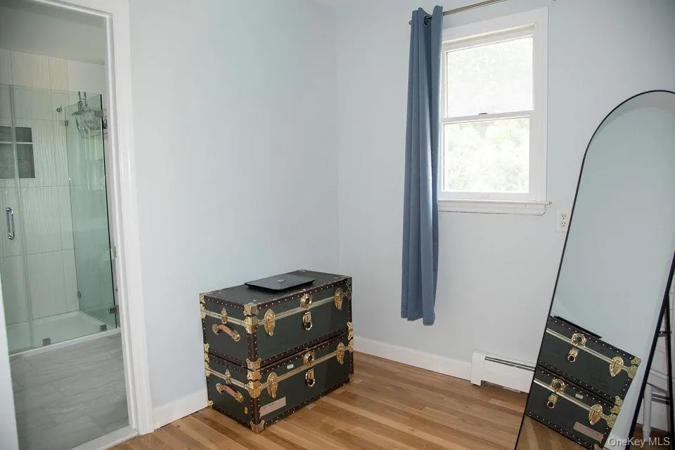 Additional space in primary bedroom between the primary bathroom and walk in closet. Additional space in primary bedroom between the primary bathroom and walk in closet.