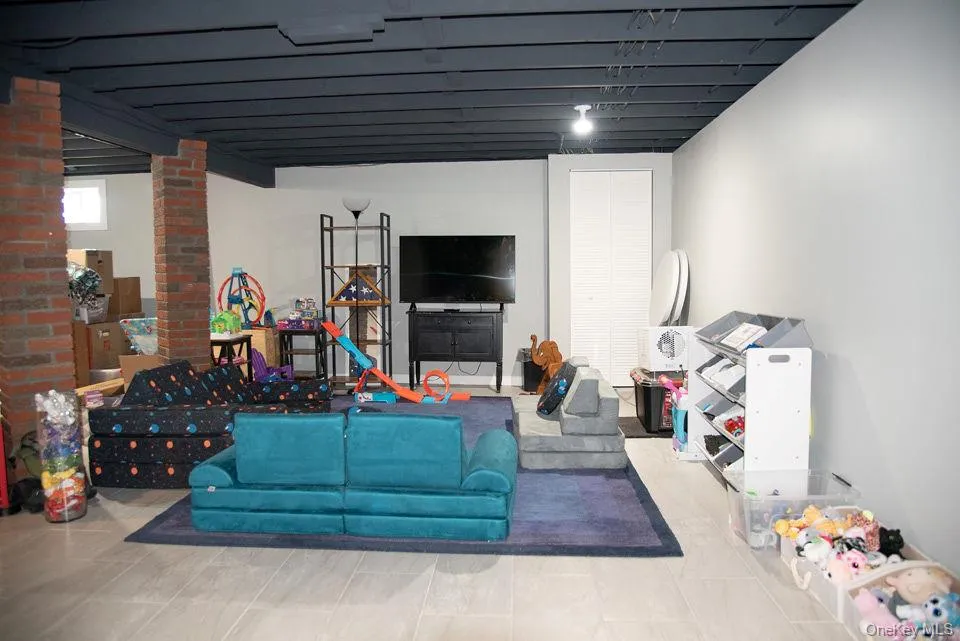 Finished basement used as a recreation room Finished basement used as a recreation room