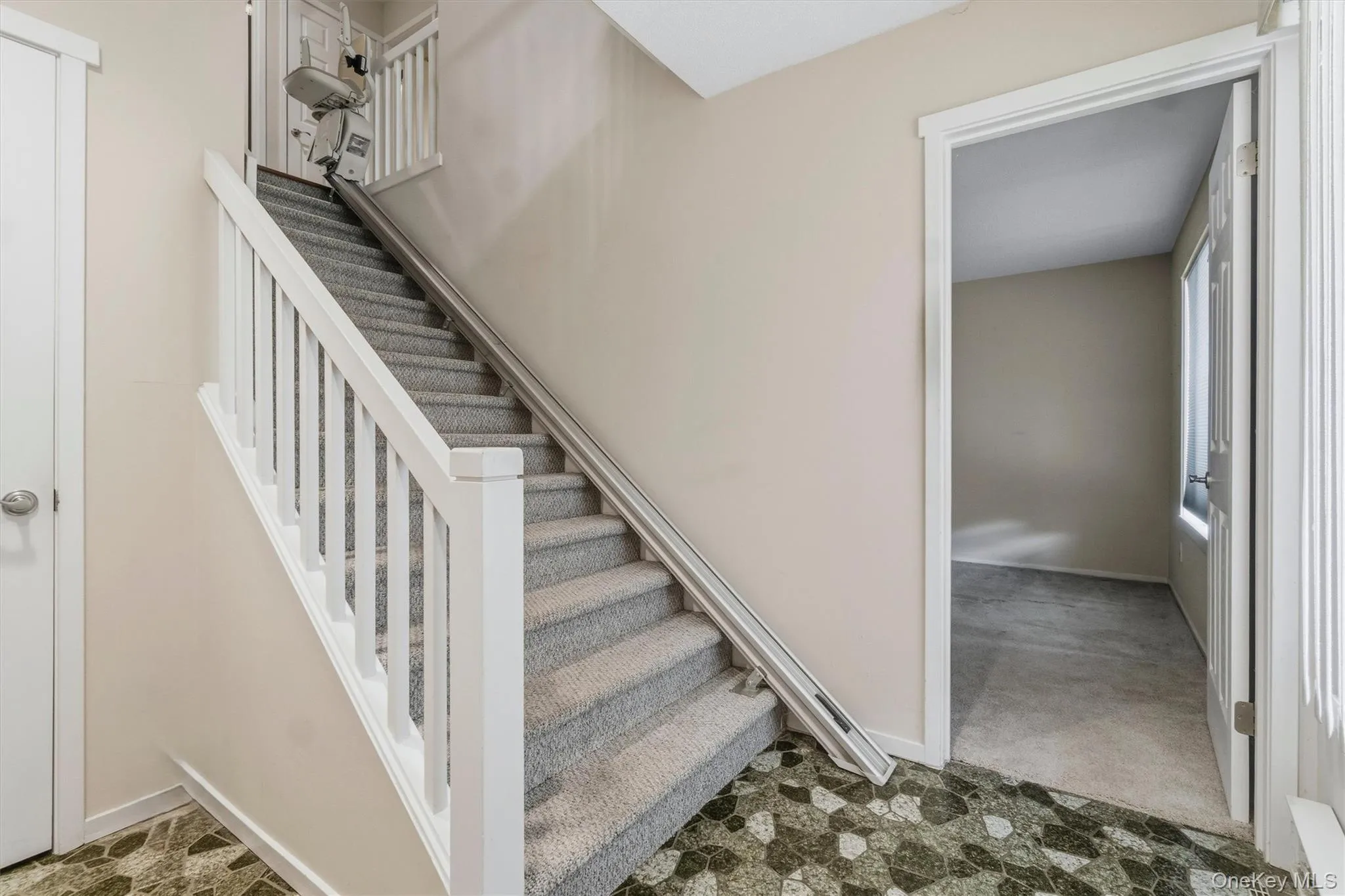 Entry with a peek into first floor Family Room or potential 3rd Bedroom Entry with a peek into first floor Family Room or potential 3rd Bedroom