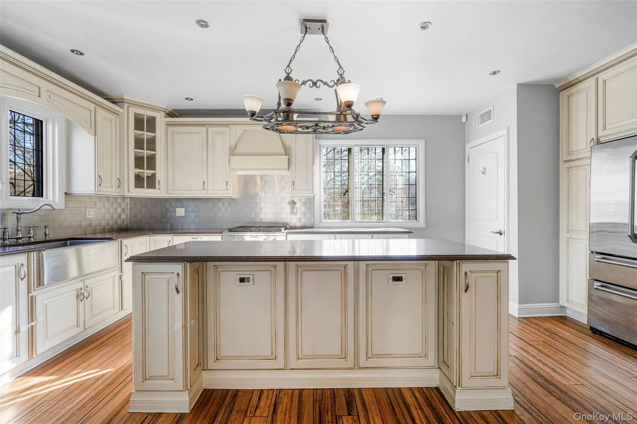 Kitchen with center island and room for 2-4 stools. Kitchen with center island and room for 2-4 stools.