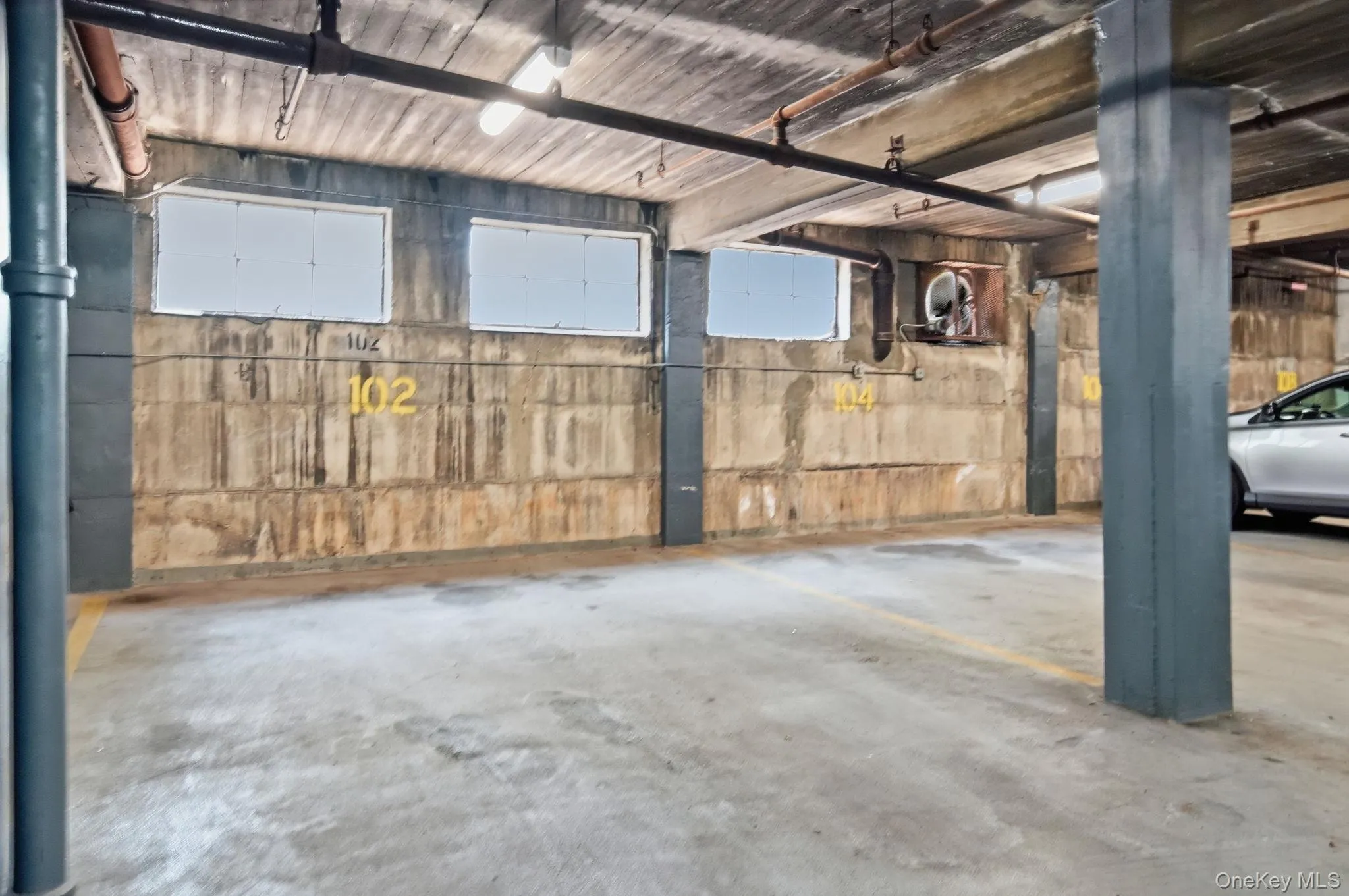 Deeded Garage Parking Spot #102 Deeded Garage Parking Spot #102