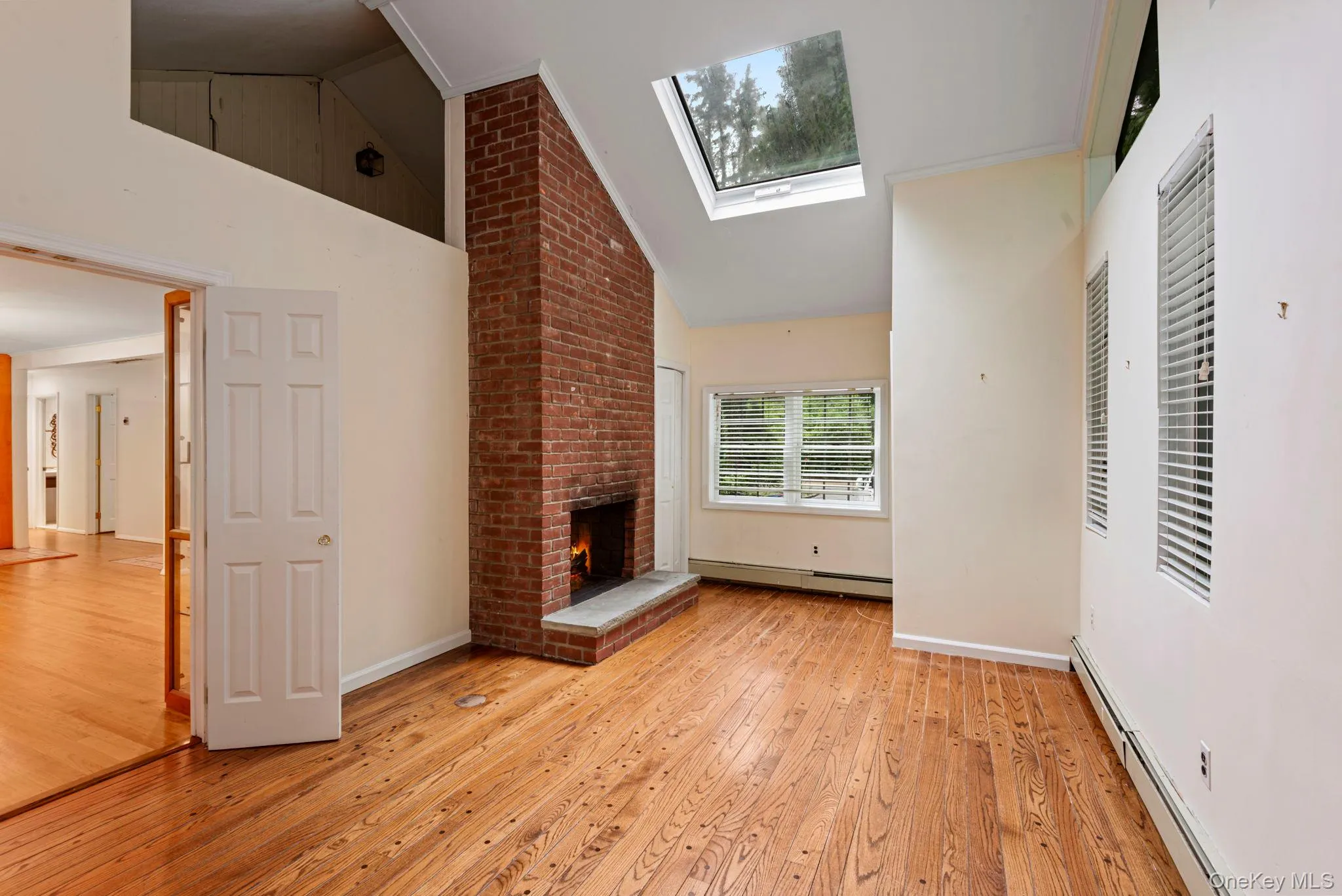 Amazing bedroom with 2 closets, loft area, fireplace, and vaulted ceilings Amazing bedroom with 2 closets, loft area, fireplace, and vaulted ceilings