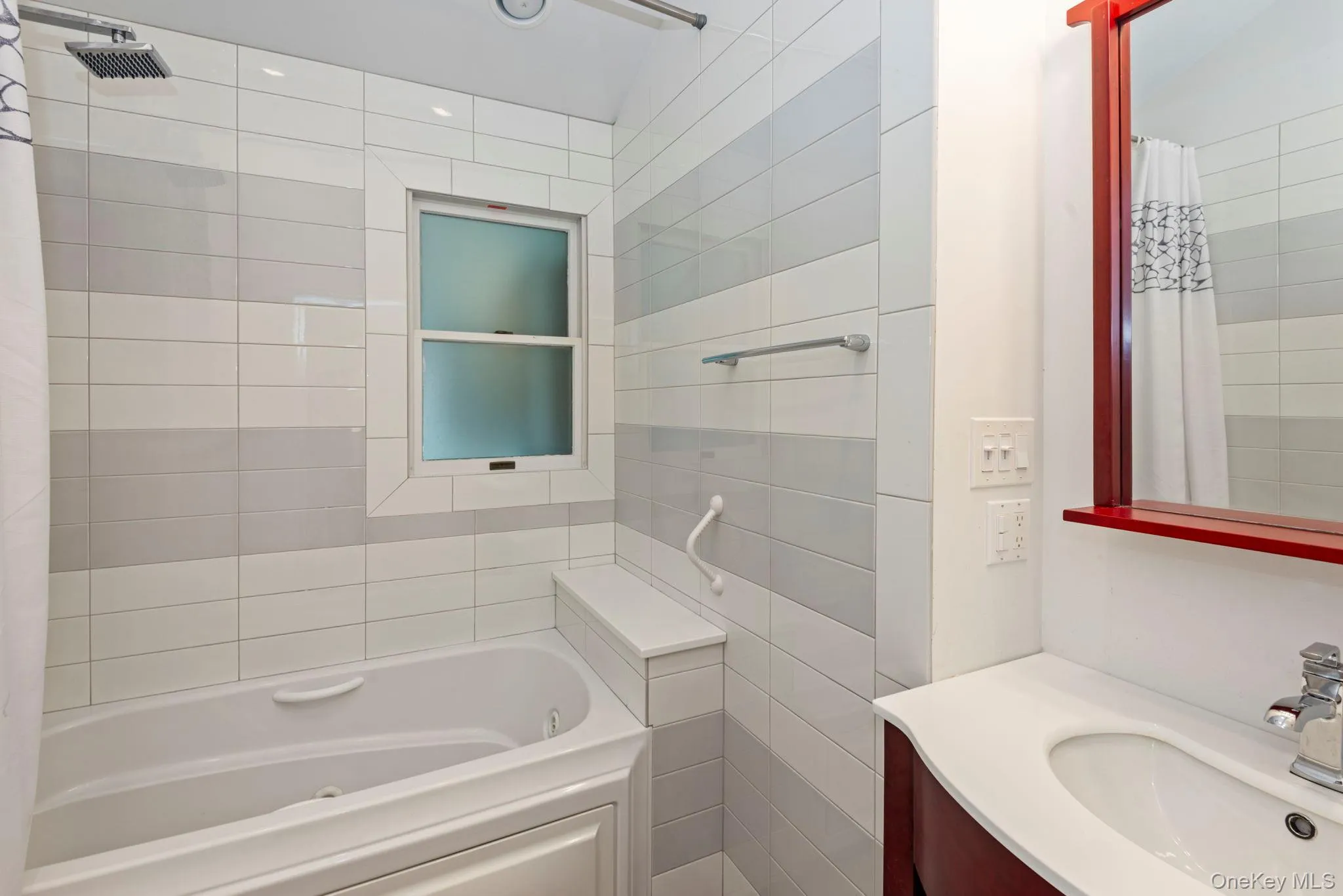Primary ensuite bathroom with vaulted ceiling Primary ensuite bathroom with vaulted ceiling