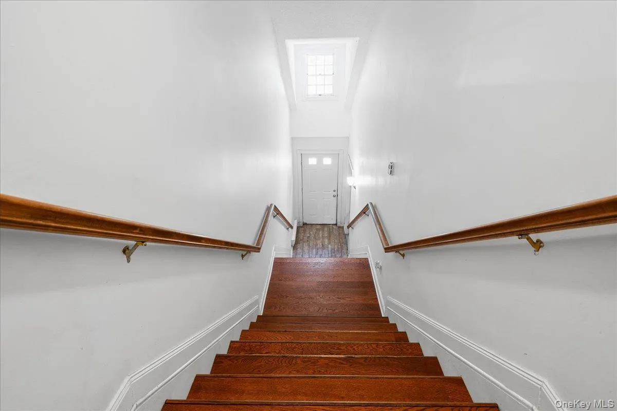 Stairs and front entry Stairs and front entry