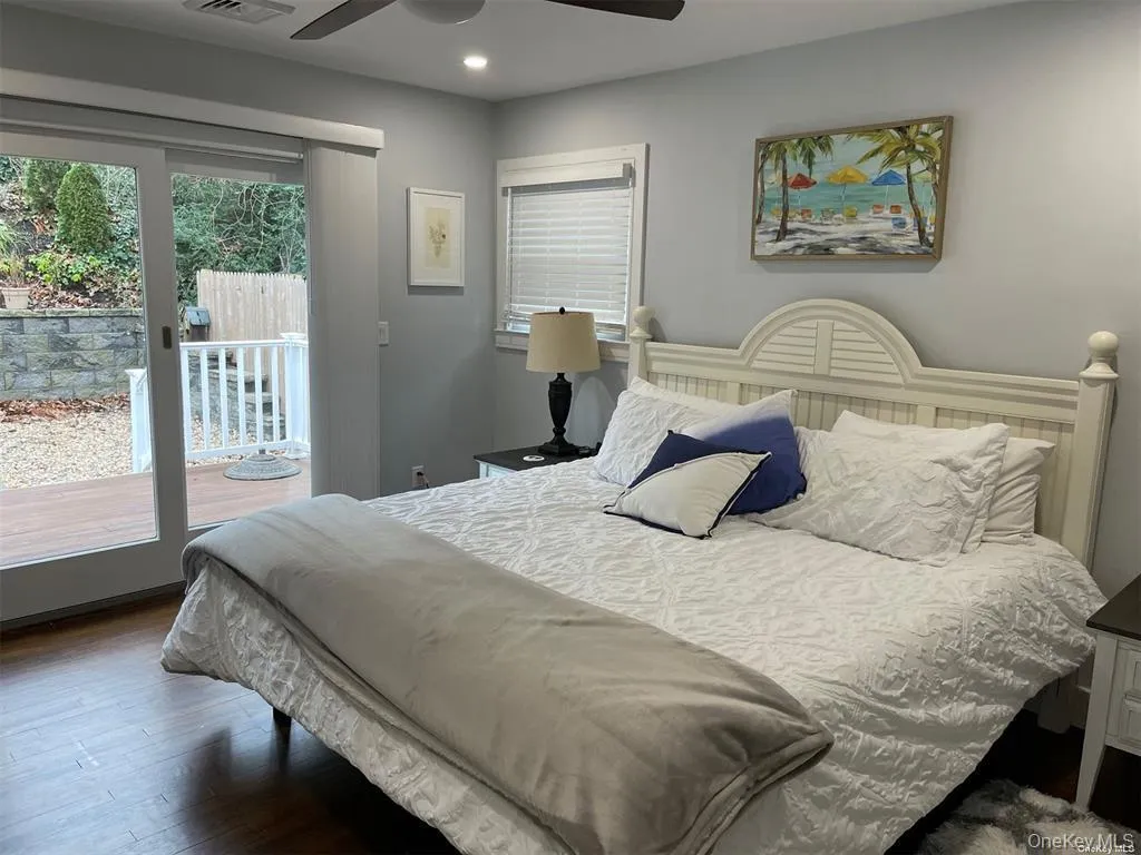 Primary Bedroom..... King Sized Bed and two Night Stands & Lamps Primary Bedroom..... King Sized Bed and two Night Stands & Lamps