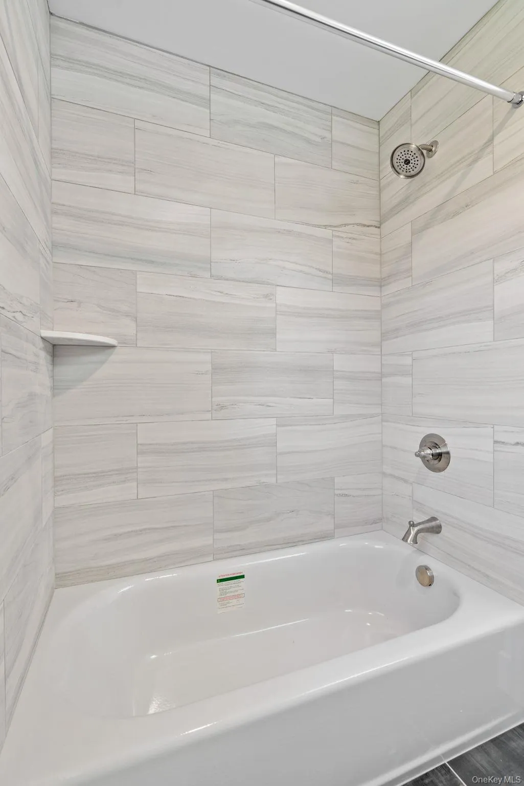 Full bath featuring shower / bathtub combination Full bath featuring shower / bathtub combination