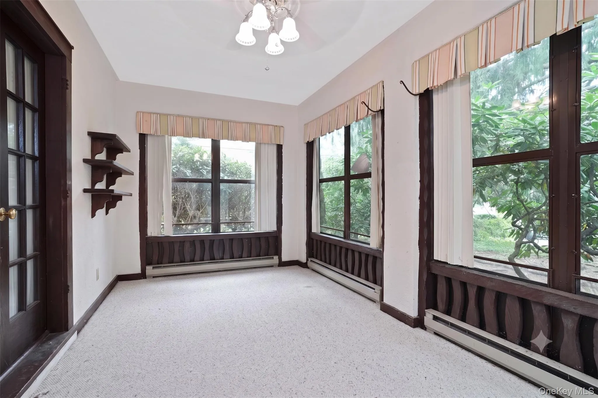 Sunroom (edited to remove stored items) Sunroom (edited to remove stored items)