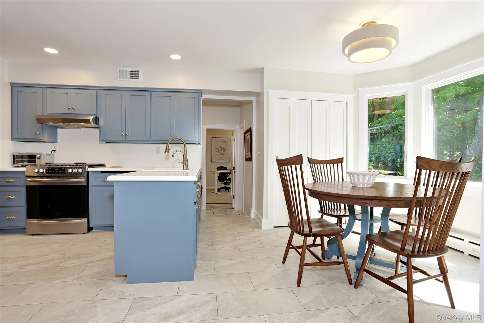 Updated porcelain tiling, corian counters and recessed lighting. Updated porcelain tiling, corian counters and recessed lighting.