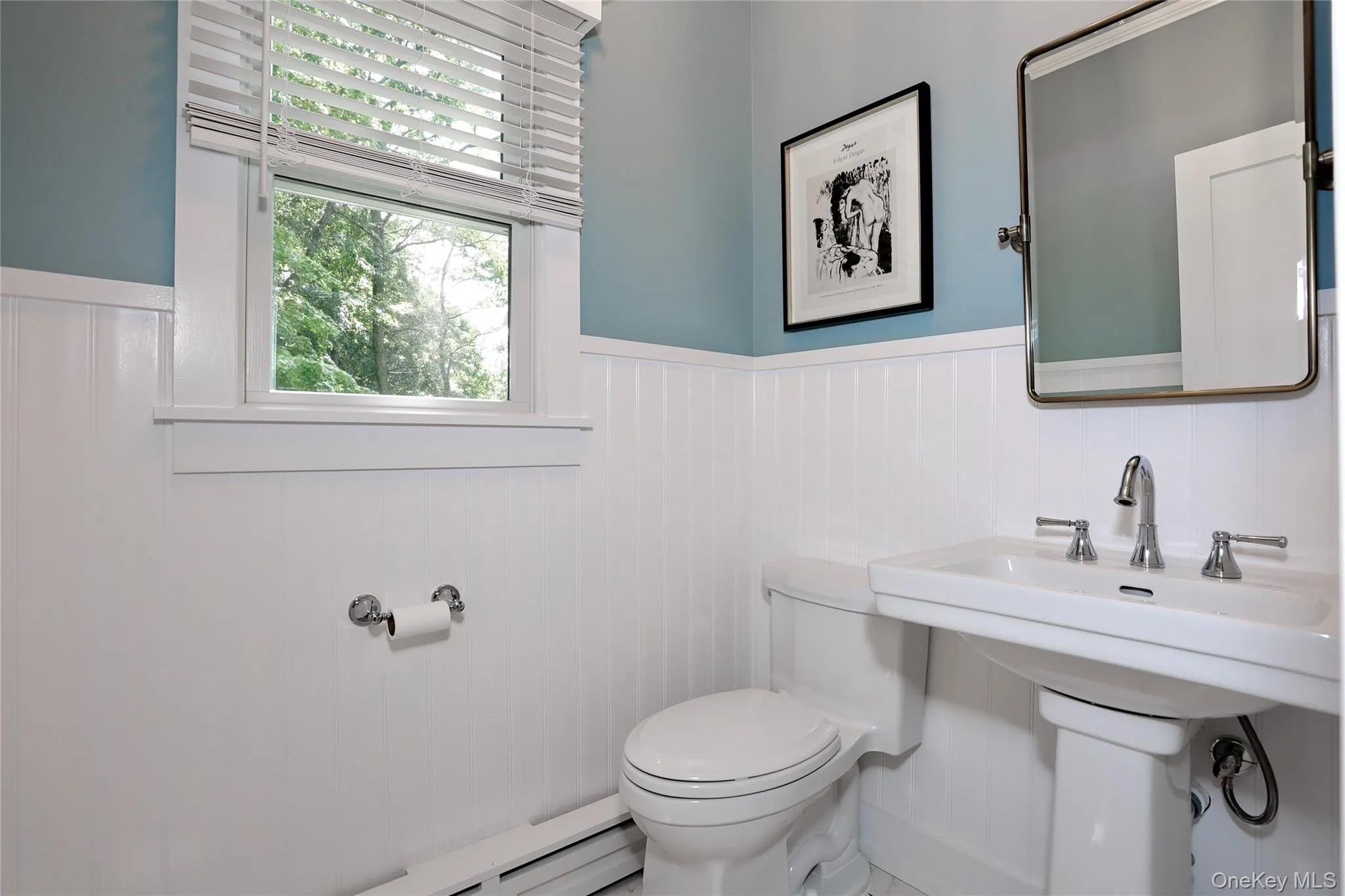 Guest half-bath on the main level. Guest half-bath on the main level.