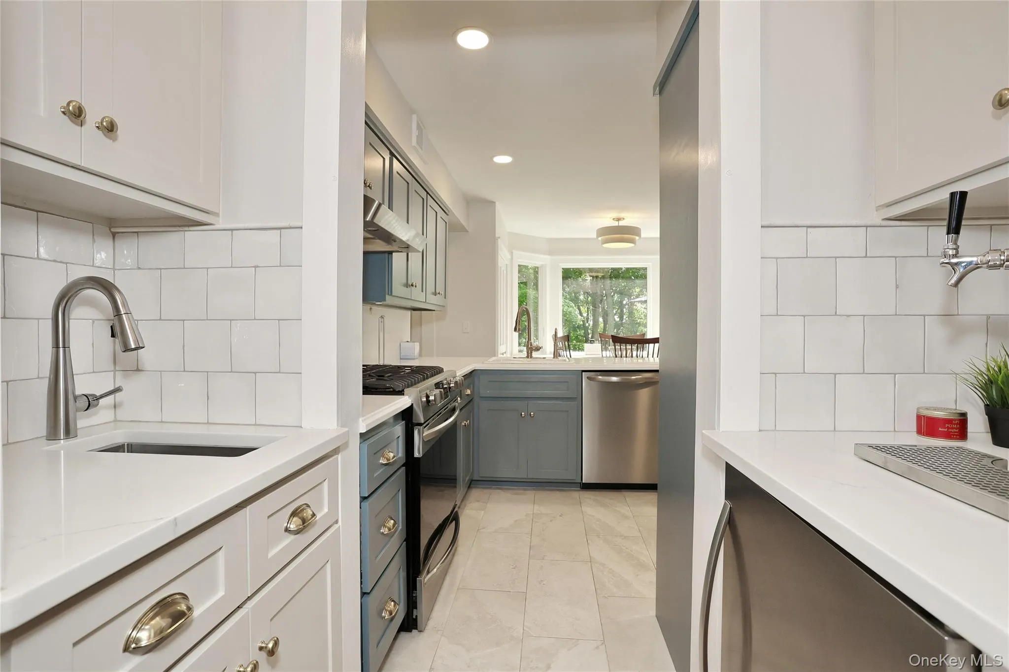 The Butler's Pantry links the Kitchen to the Dining Room & features a prep sink & additional storage. The Butler's Pantry links the Kitchen to the Dining Room & features a prep sink & additional storage.