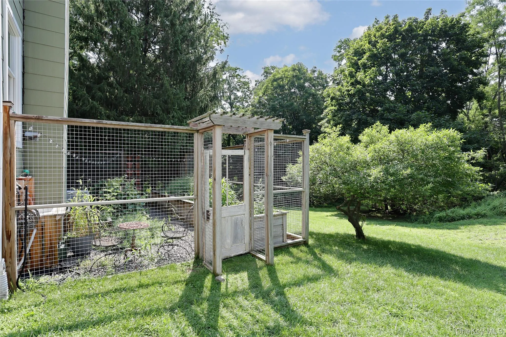 Fenced Kitchen Garden for herbs & plantings. Who doesn't love a home-grown tomato? Fenced Kitchen Garden for herbs & plantings. Who doesn't love a home-grown tomato?
