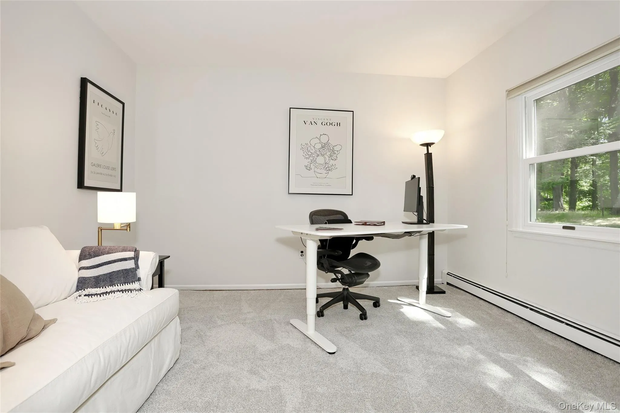 Main level Office/Den/Bedroom located off the kitchen area. Main level Office/Den/Bedroom located off the kitchen area.