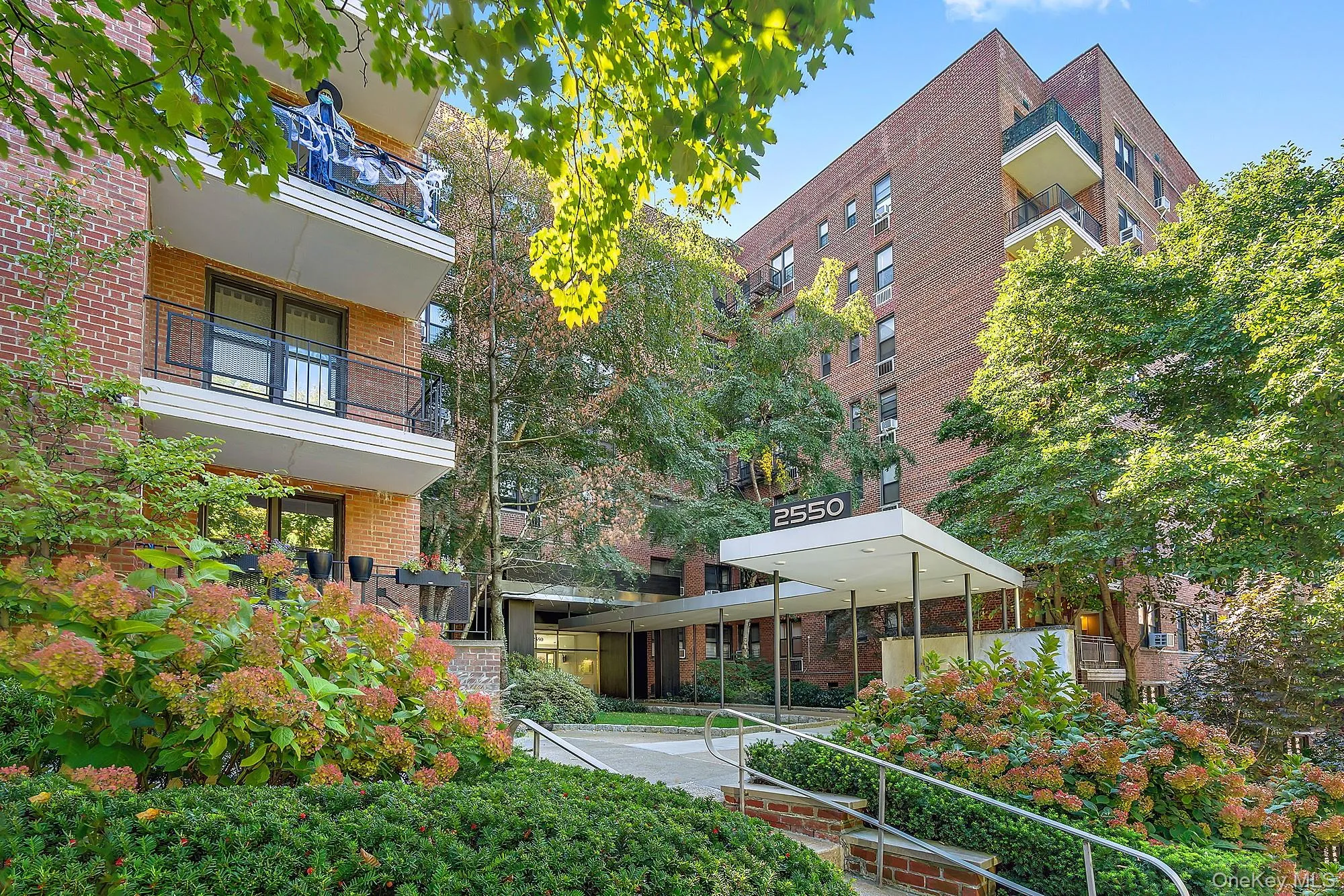 Beautifully landscaped entrance to the building. Beautifully landscaped entrance to the building.