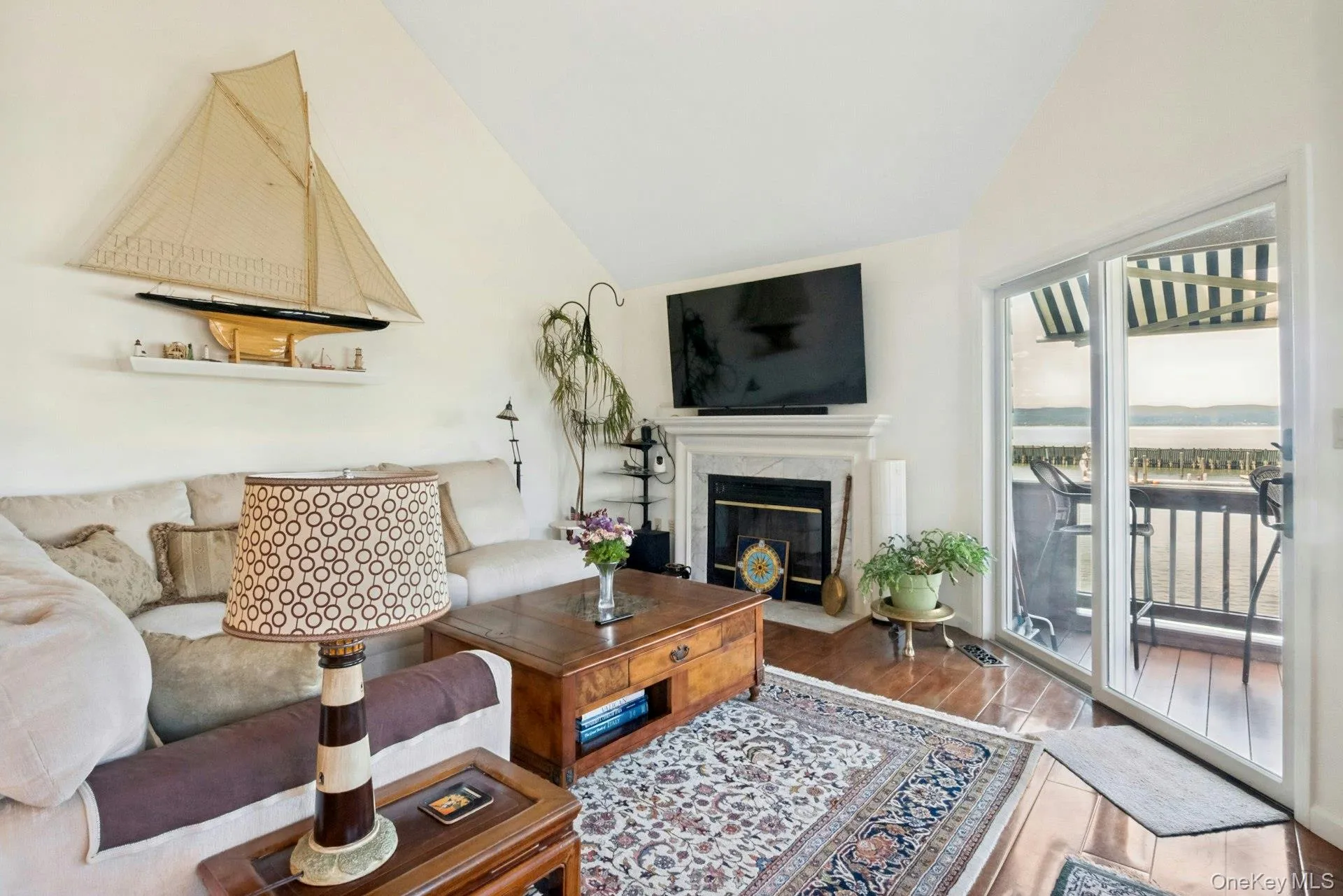 Open floor plan with fireplace and vaulted ceilings. Open floor plan with fireplace and vaulted ceilings.